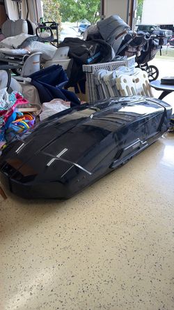 Thule black rooftop cargo carrier