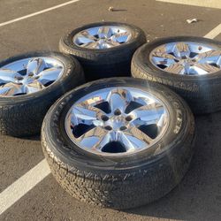 Factory Chrome 20” 5 lug rims & Goodyear wrangler tires ~ good tread  Nice wheels and tires and fit 25+ years of dodge ram 5x139.7 pattern.  $720 FIRM