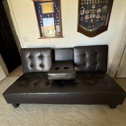 🛋️ Convertible Futon Sofa Bed with Cup Holders – $120 (Corona)