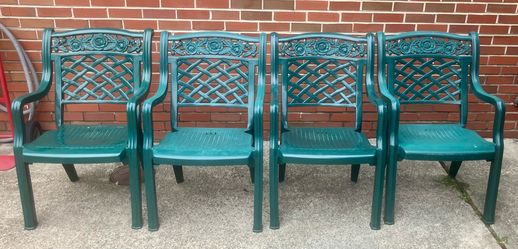 4 Hard Plastic Outdoor Chairs w/ Intricate Floral Design