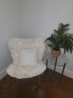 Moving sale. Pick up tomorrow. Chair, glass table, artificial palm tree.