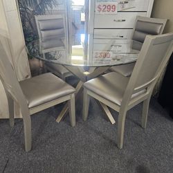 Brand 48" Round Glass Dining Table  + 4 Gold Vinyl Chairs