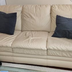 Leather Cream Couch and Matching Love Seat . SENDING TO HABITAT 4 HUMANITY SATURDAY 20