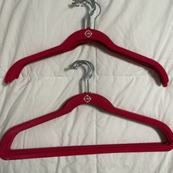 24  Joy Mongano Hot Pink Hangers