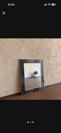 One Modern Black and Silver Wall Mirror