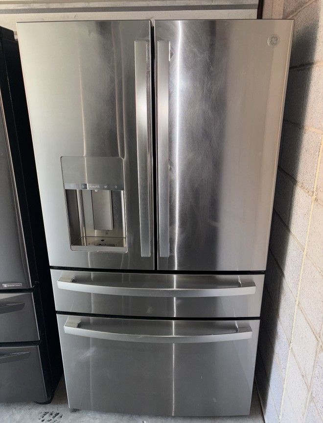 GE Stainless Steel Refrigerator And Freezer