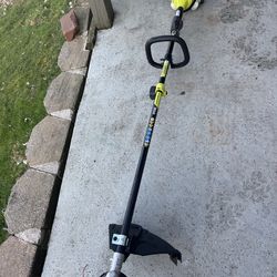 Like New Ryobi String Trimmer Attachment Capable String Trimmer 25cc Engine 2 Stroke.Must Pick Up