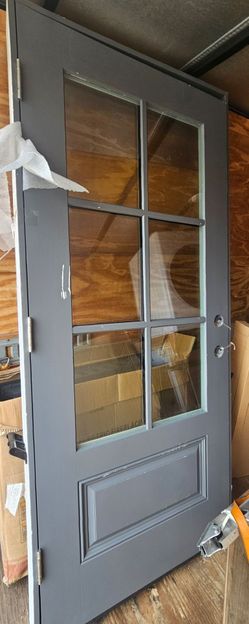 GREY DOOR WITH FRAME.....36" x 80".......$ 350