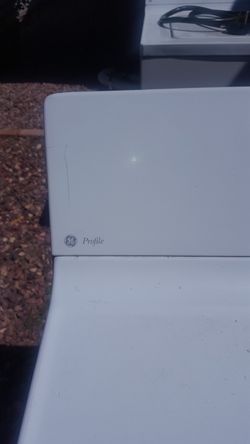 GE Dryer no plug and squeaks if too large of load is in