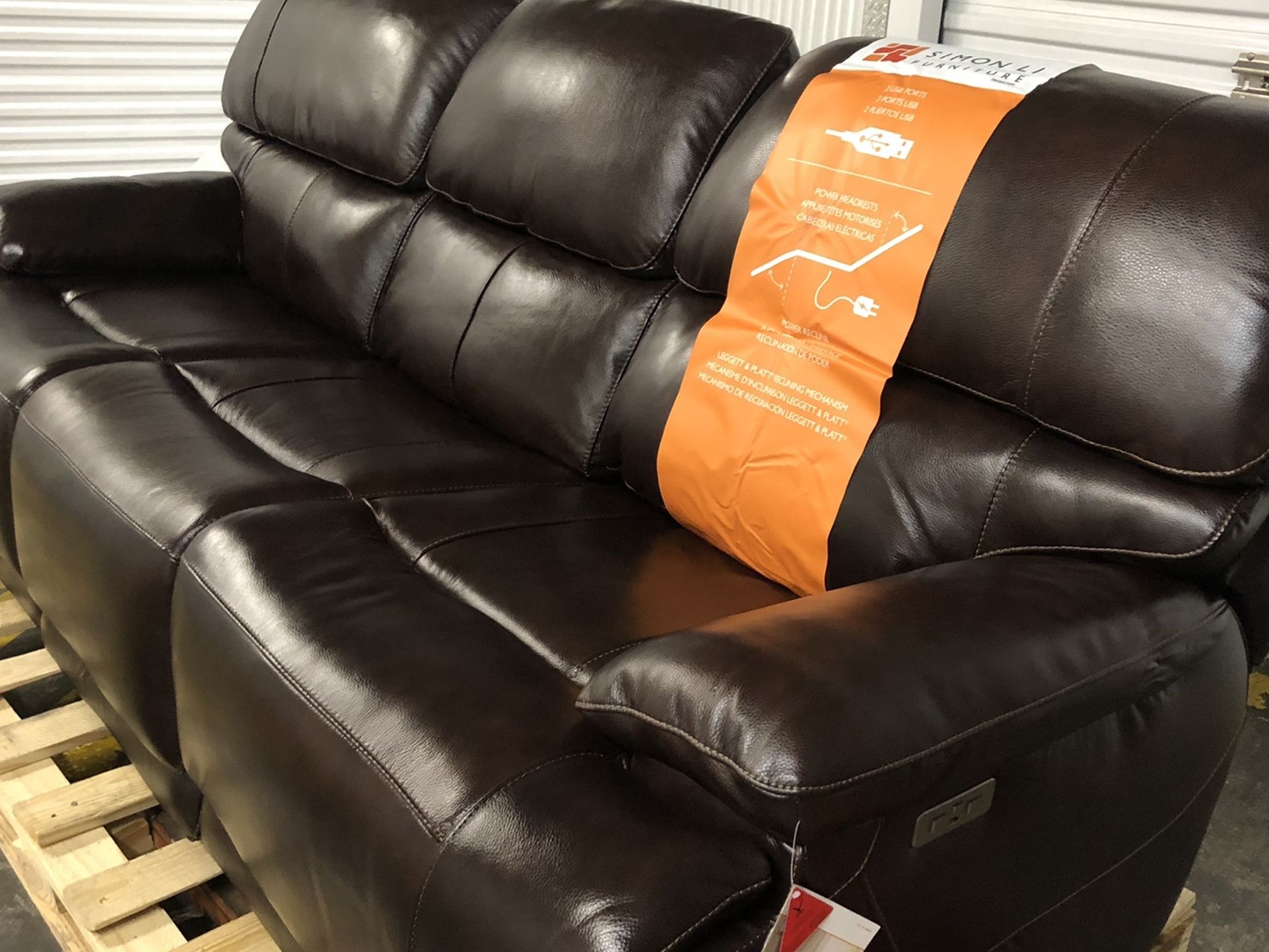 Brand New Aleena Leather Power Reclining Sofa with Power Headrest Originally priced at $1,089 Top Grain Leather Features: Color: Dark Brown Covered
