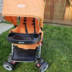Joovy Caboose Ultralight Sit Stand Double Stroller - Orange