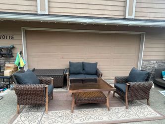Outdoor furniture with storage and large glass top table
