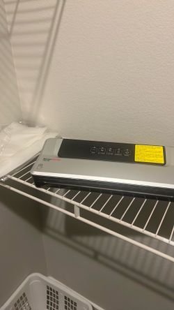 Bonsenkitchen VS2100 silver vacuum sealer.