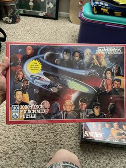 vintage 1993 F.X. Schmid Star Trek: The Next Generation 1000-piece jigsaw puzzle featuring artwork by Paul Wenzel.