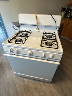 Estufa de gas en perfectas condiciones x $250.   O mejor oferta