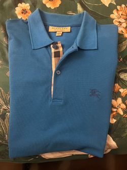 Playera polo.  BURBERY  original