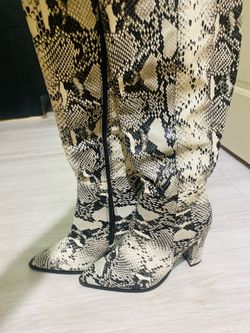 Snakeskin knee boots