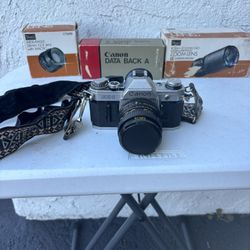Classic Canon AE-1 film camera setup. With Lenses 