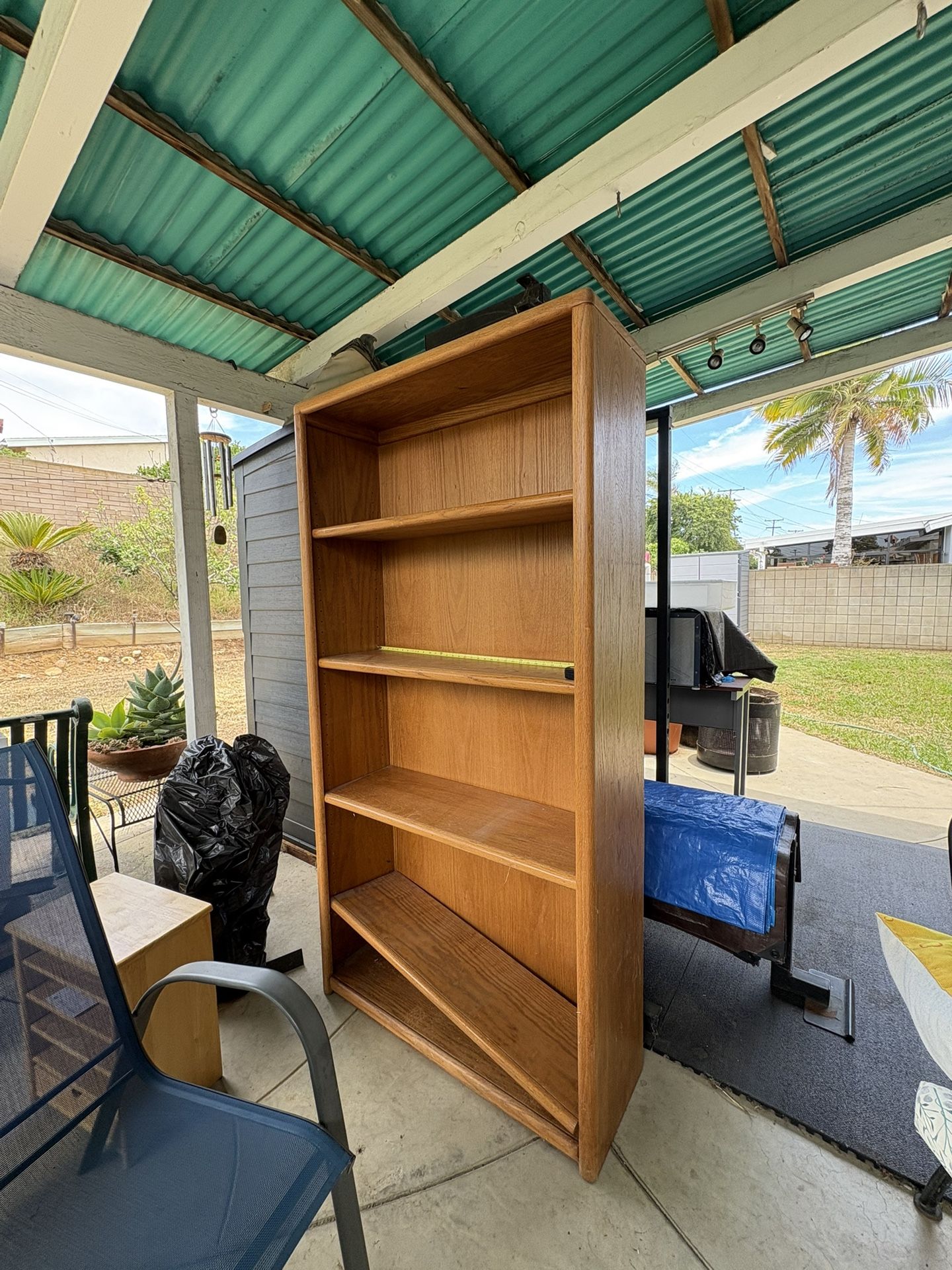 Book Shelf. 70 1/2 By 34 1/2. 5 Compartments. Is Missing One Of The Pins That Holds The Shelf, That’s Easy To Fine In Home Depot.