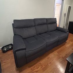 Auto reclining grey couches