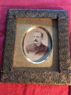 19TH CENTURY BRASS-LIKE FRAME W/ CABINET CARD MAN W/ MOUSTACHE