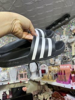 Adidas slides / size 7 gentle used/ firm on the price