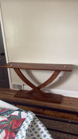 Long solid wood accent table