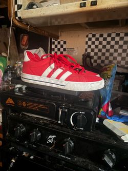 Red and white Addidas 9.5