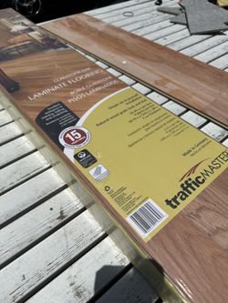 1 Case of Brand New TrafficMaster Gladstone Oak 7mm Laminate Wood Flooring