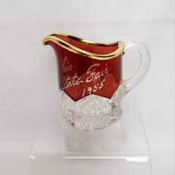 Cut glass cream pitcher miniature with red top etched Ohio state fair 1955 . 