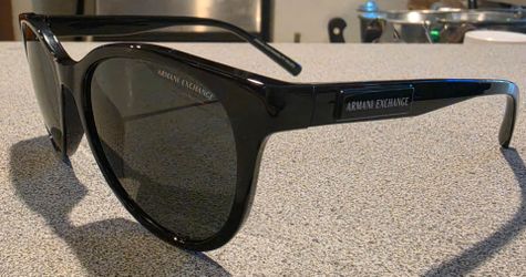 Armani Exchange Sunglasses w/ dark grey lenses.