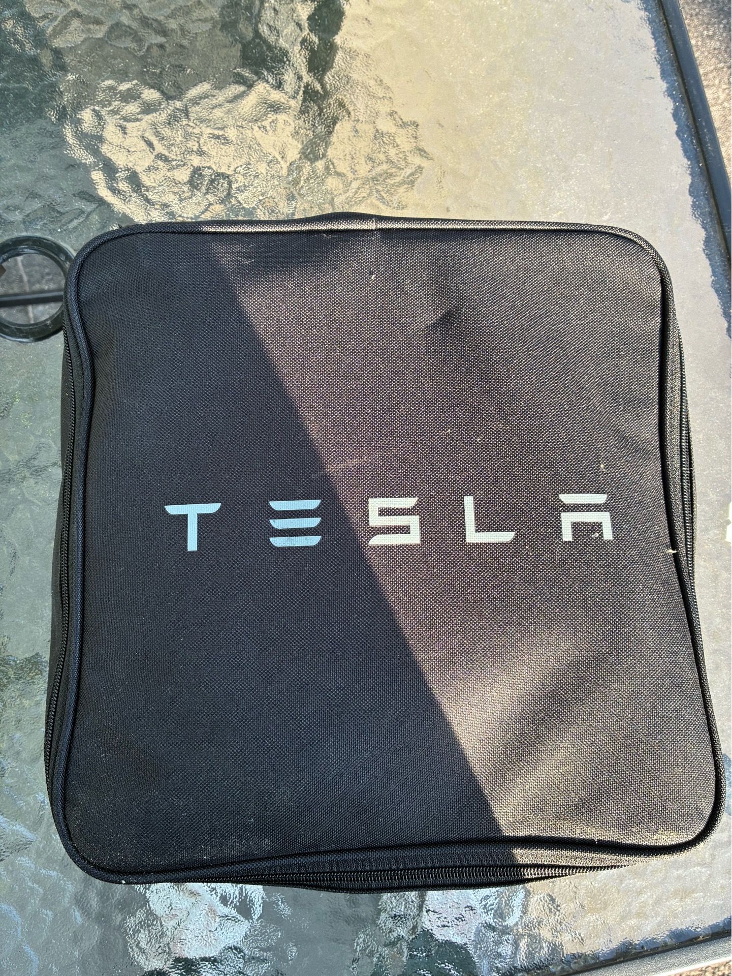 Tesla Portable charger.