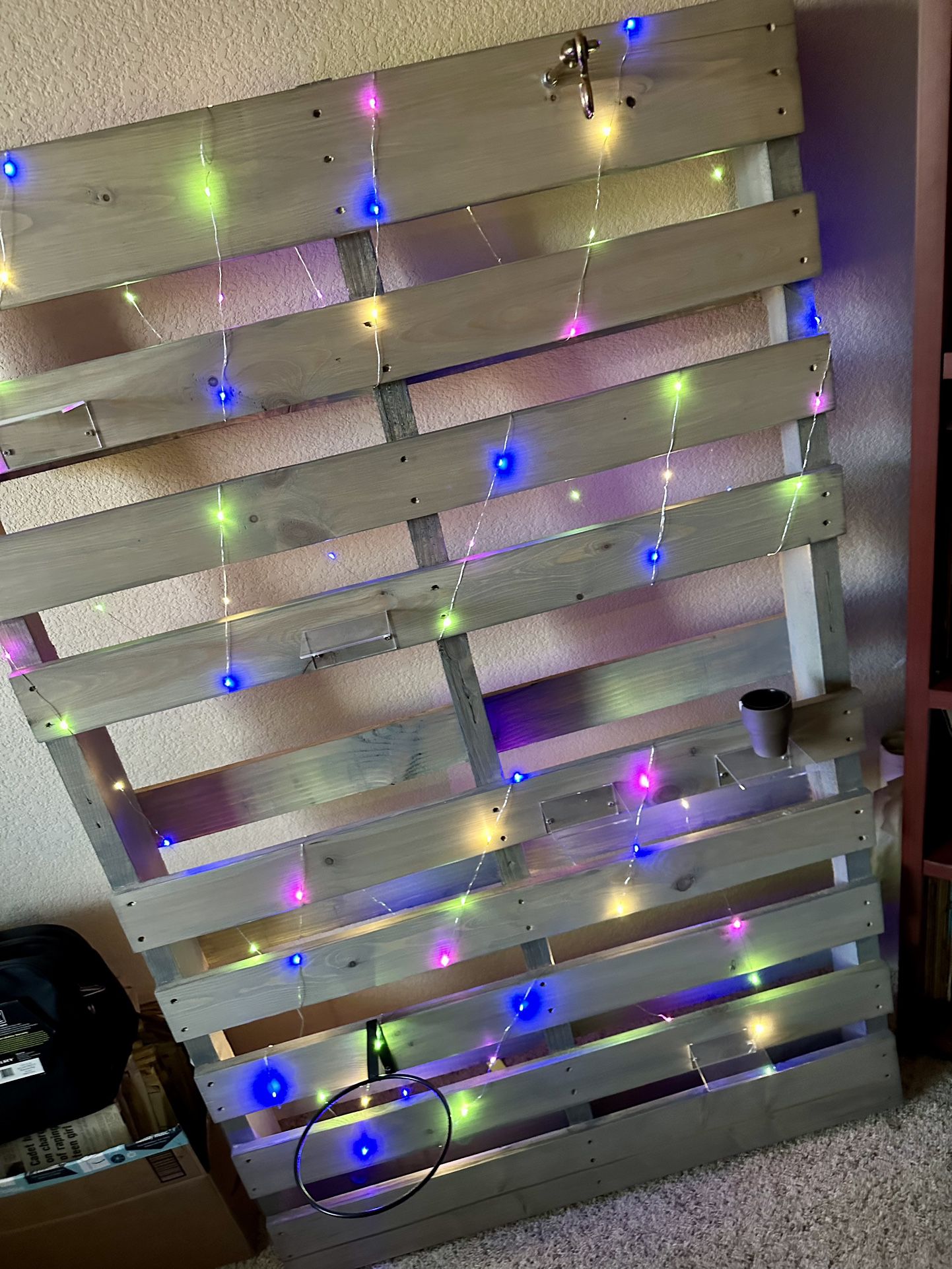 Weathered Grey Pallet Plant Wall w/ fairy lights. 