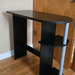 Computer desk with built-in shelves 