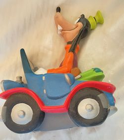 a vintage Walt Disney Goofy figurines