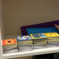 1000+ pokemon cards plus cat plushie shoulder play fight toys  and HUGE pop it toy