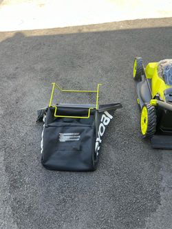 Ryobi 40V HP Brushless 20 in. cordless electric self-propelled lawn mower with 4.ah battery and charger.