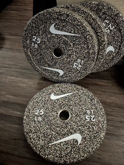NIKE BUMPER WEIGHTS 4x25 LBS $130 per pair or take all 4 for $240 (NEW)