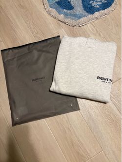 Light oatmeal essential hoodie xs and small