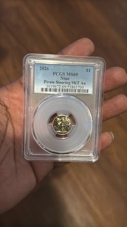 • 2026 Niue $1 Pirate Steering 1g Gold Coin PCGS MS69 Graded