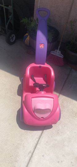 Push pink car