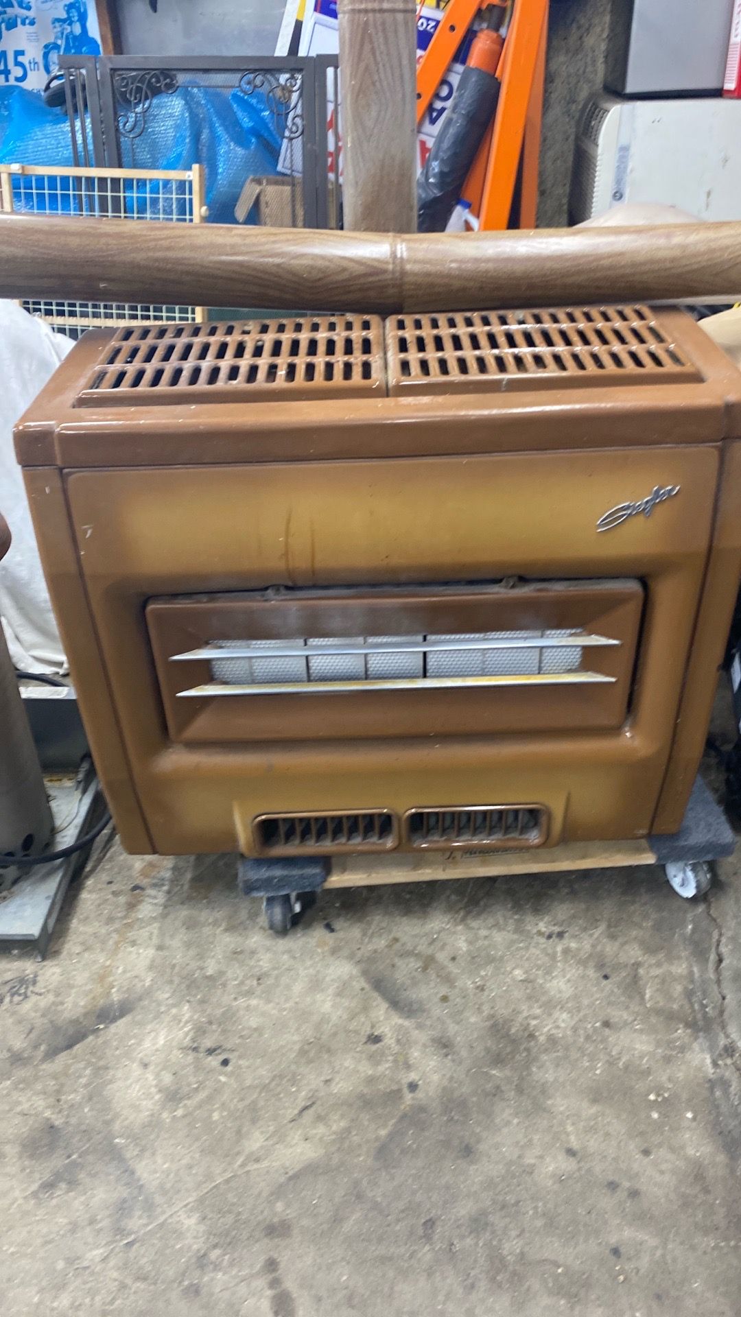 Antique Siegler whole house Furnace with wooden 4 inch flue pipe