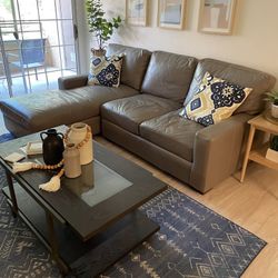 Sofa leather taupe color, excellent condition less than 2 years old 