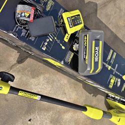 RYOBI 40V 15 in. Expand-It Cordless Battery Attachment Capable String Trimmer with 4.0 Ah Battery an