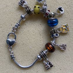 Silver Pandora Bracelet With 11 Assorted Charms