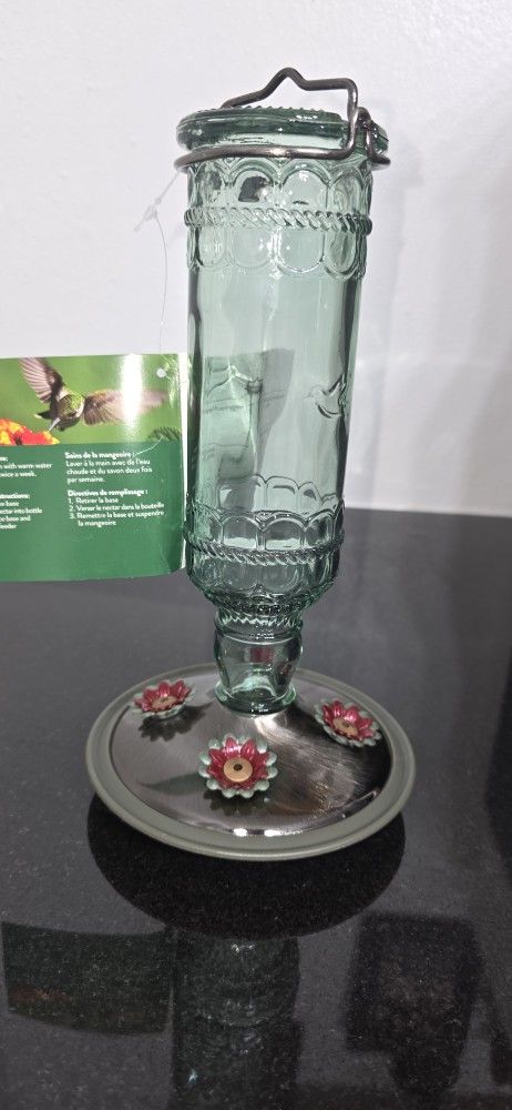 Glass hummingbird feeder