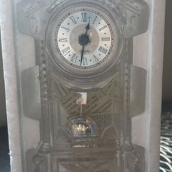 This is a Godinger Crystal Legends desktop grandfather clock made from 24% lead crystal.