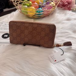 Gucci Guccissima Bamboo Tassel zip around wallet