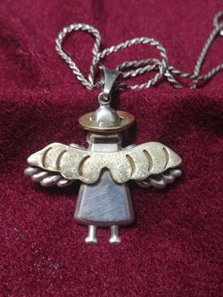 Sterling silver and gold tone angel pendant