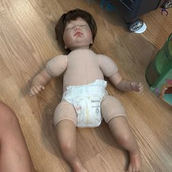 Realistic newborn baby doll 